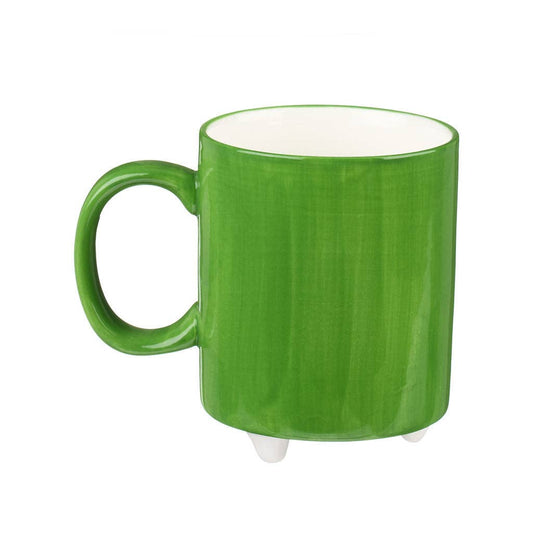 Green mug with white interior on a white background