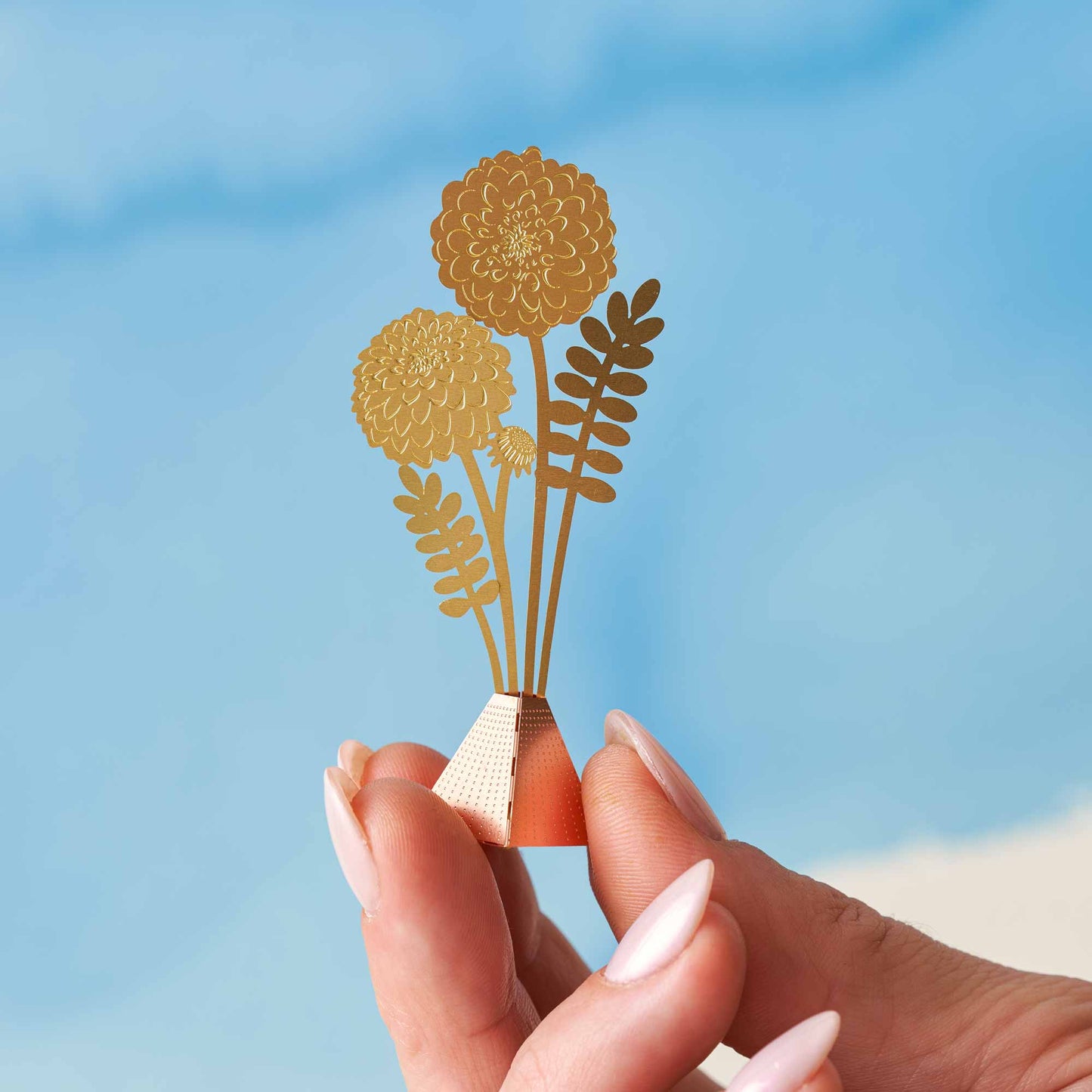 Tiny brass bouquet of Dahlias