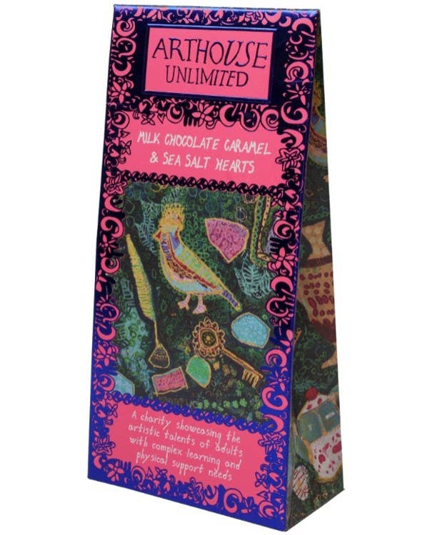 A boxed tea product standing upright on a white background. The package is branded Arthouse Unlimited and reads 'Milk Chocolate Caramel & Sea Salt Hearts.