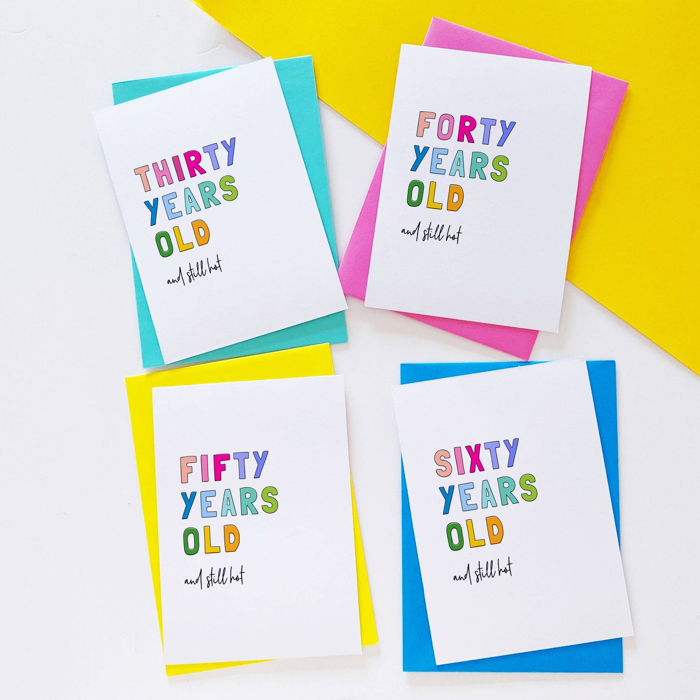 Colourful text card reading the age and still hot!