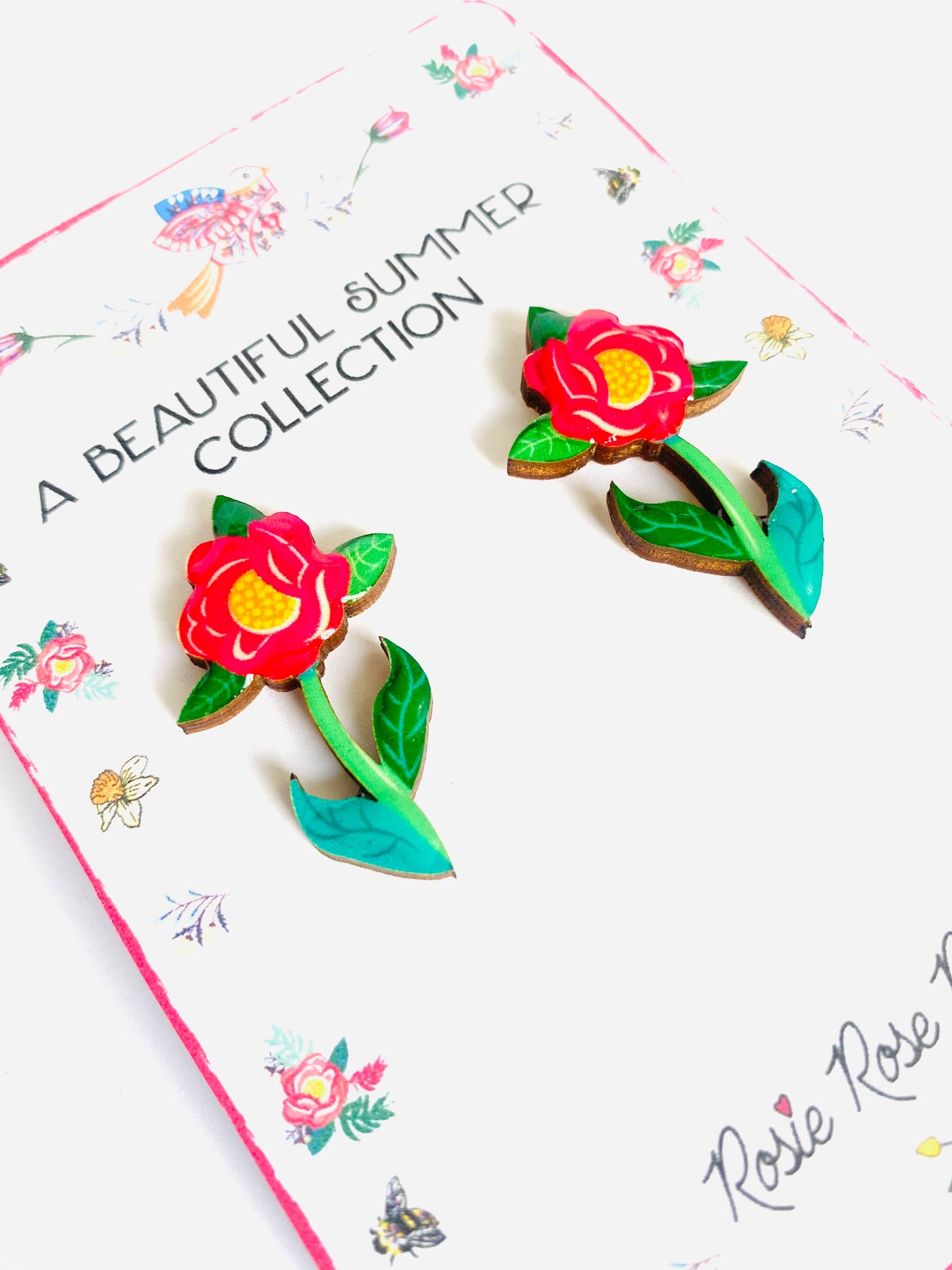 Resin and wooden flower earrings with stem.