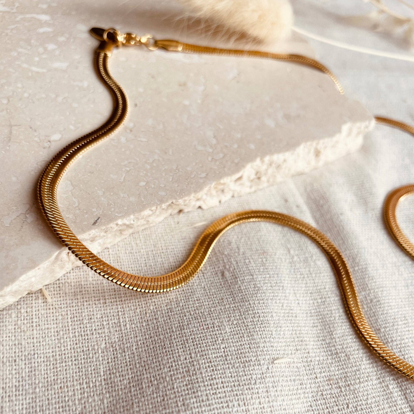 Gold plated snake chain.