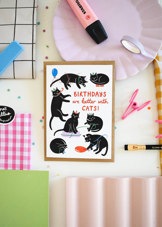 Framed print with black cats and 'Birthdays are better with cats!' text on a colorful background.