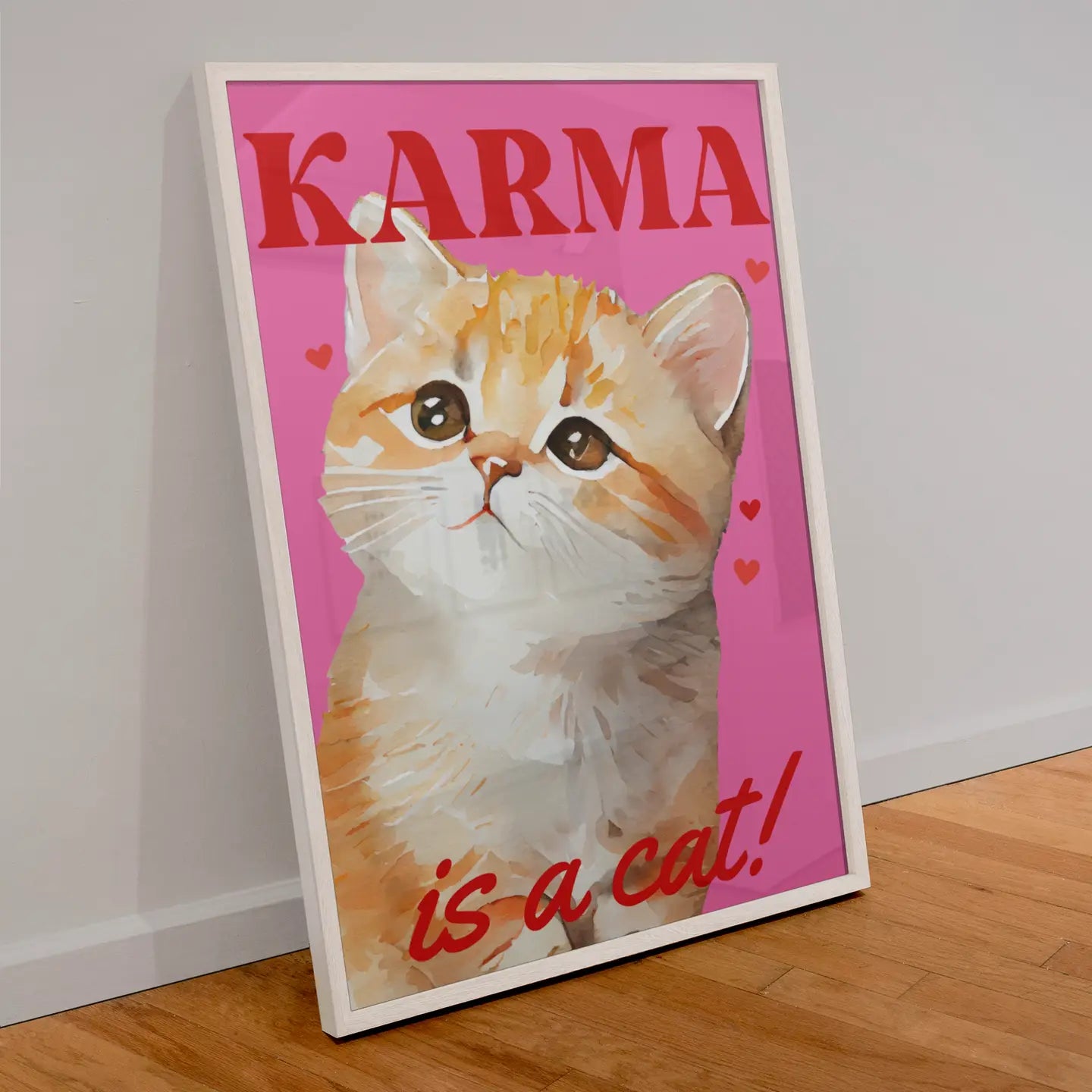 Print of a Ginger cat on pink background with text Karma is a cat!