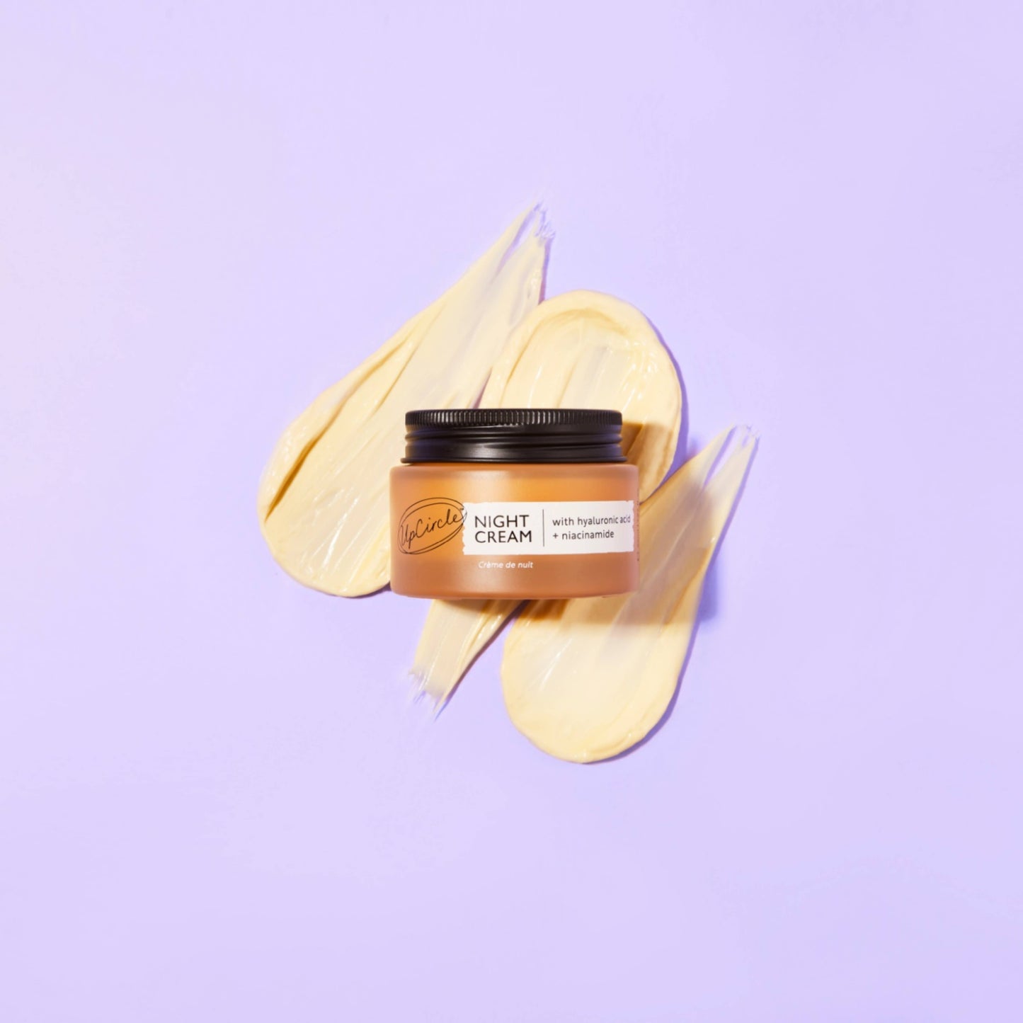 Natural Vegan night cream in glass jar. containing hyaluronic acid and niacinamide