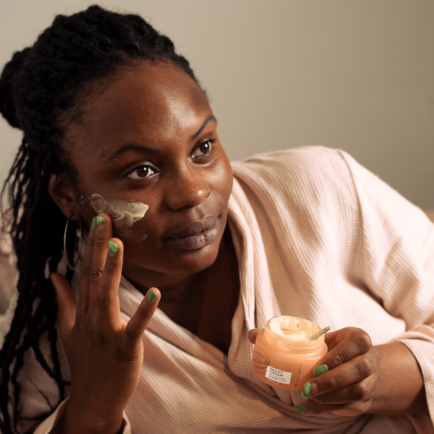Natural Vegan night cream in glass jar. containing hyaluronic acid and niacinamide