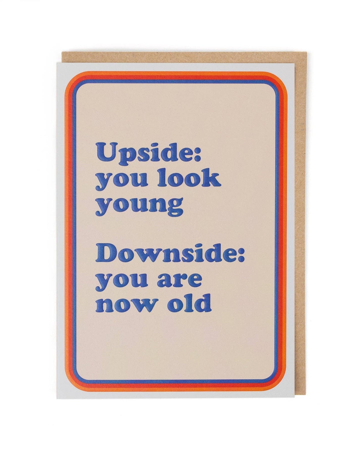 Card with humorous text 'Upside: you look young, Downside: you are now old' on a beige background with an orange border.