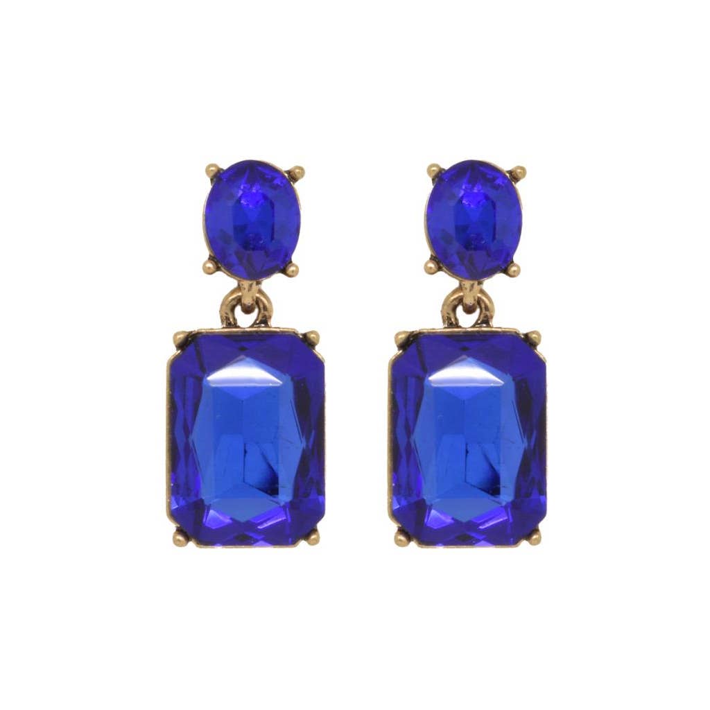Pair of blue gemstone earrings with gold accents on a white background