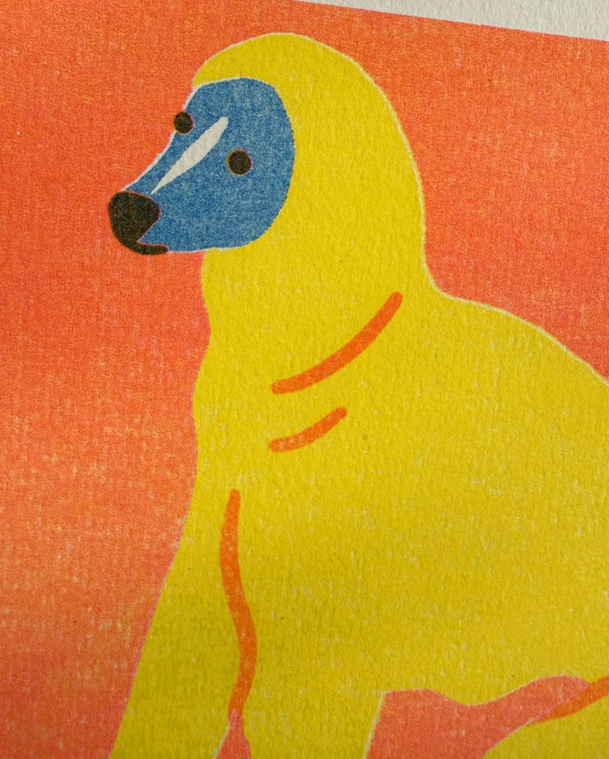 Yellow creature with blue face on an orange background
