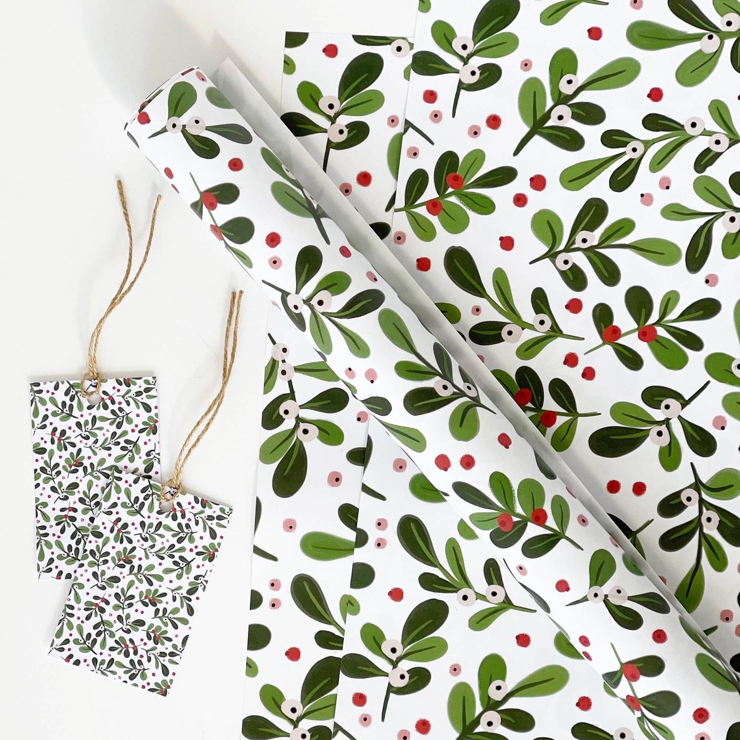 White mistletoe gift wrap suitable for Christmas or winter birthdays.