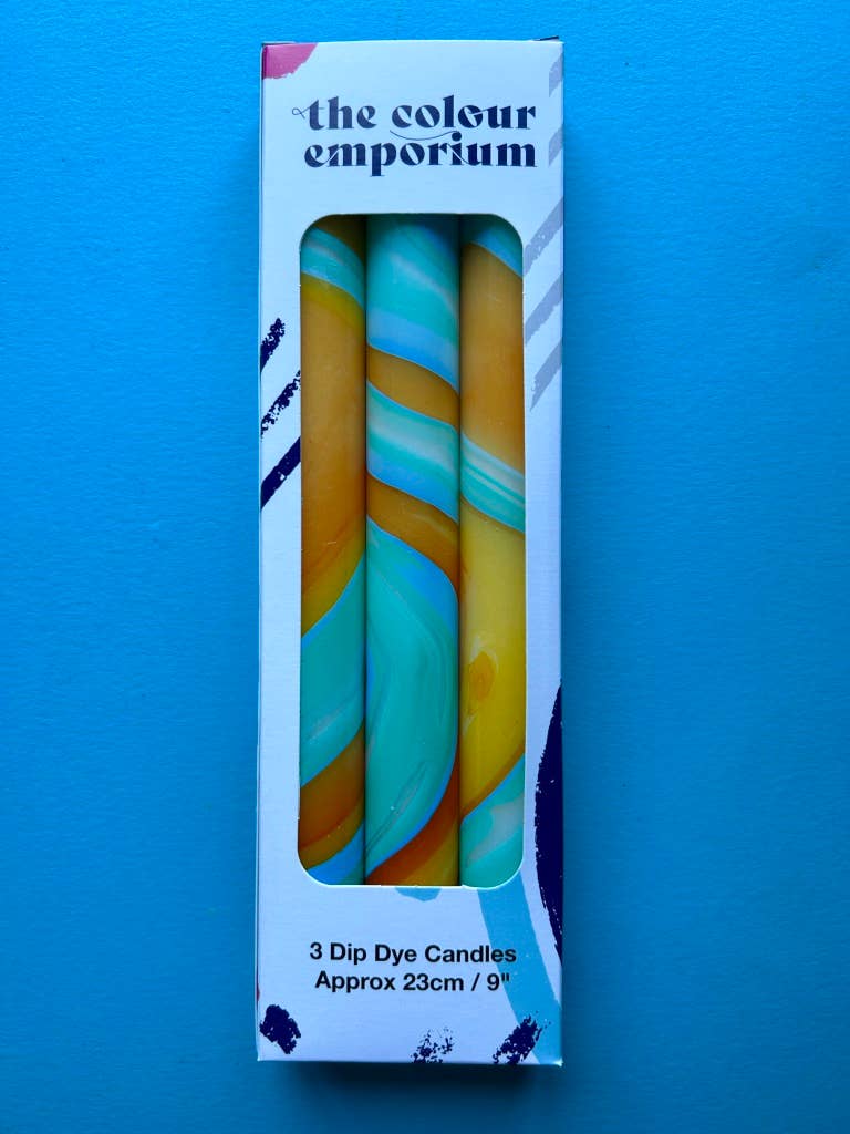 marbled dinner candles, blues and yellows.