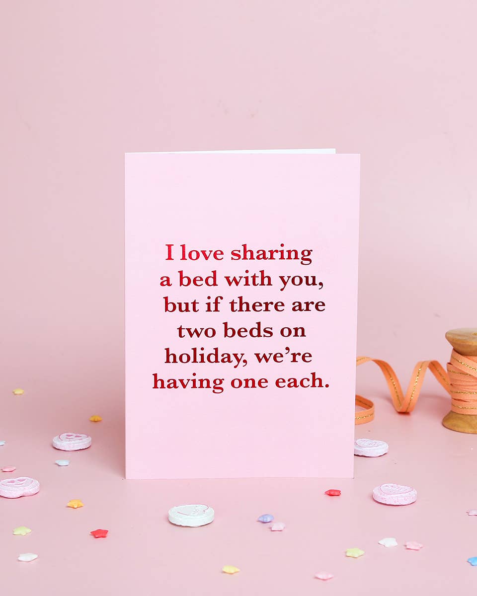 Card with romantic message on a pink background with decorative elements