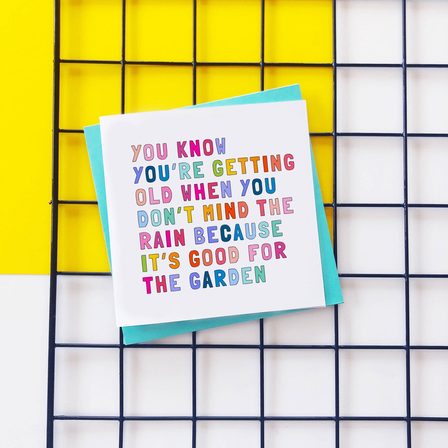 Colourful text card reading You Know you're getting old when you don't mind the rain because it's good for the garden.