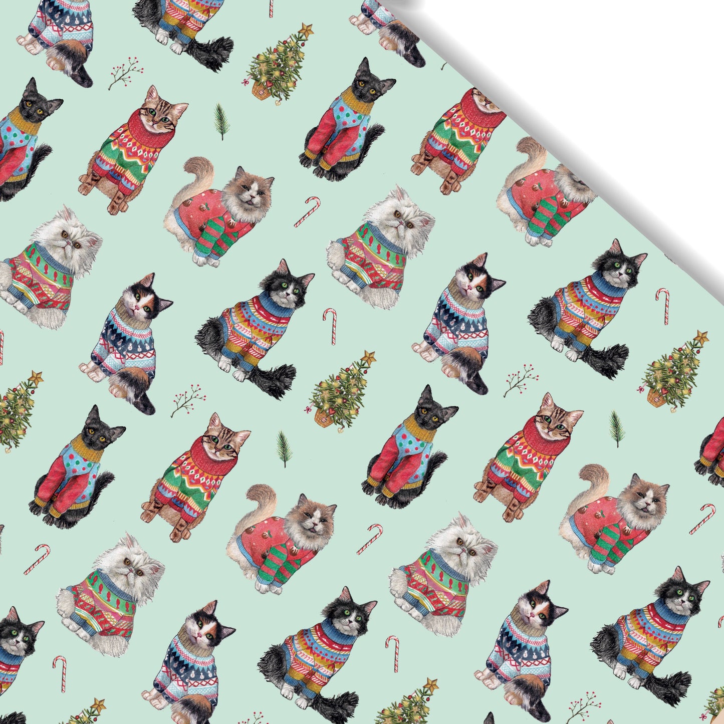 Pattern of cats wearing colorful sweaters on a light blue background