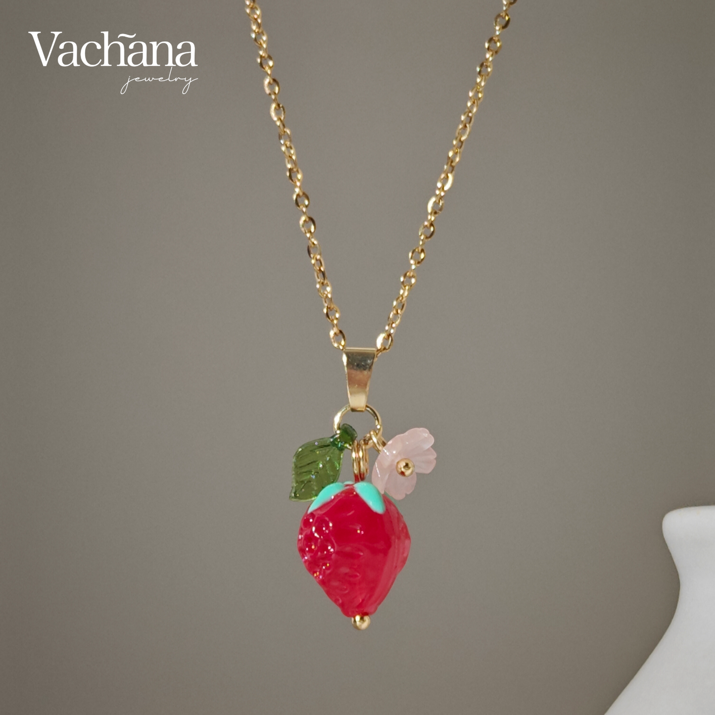 Glass Strawberry charm with arcylic leaf and flower on gold plated chain