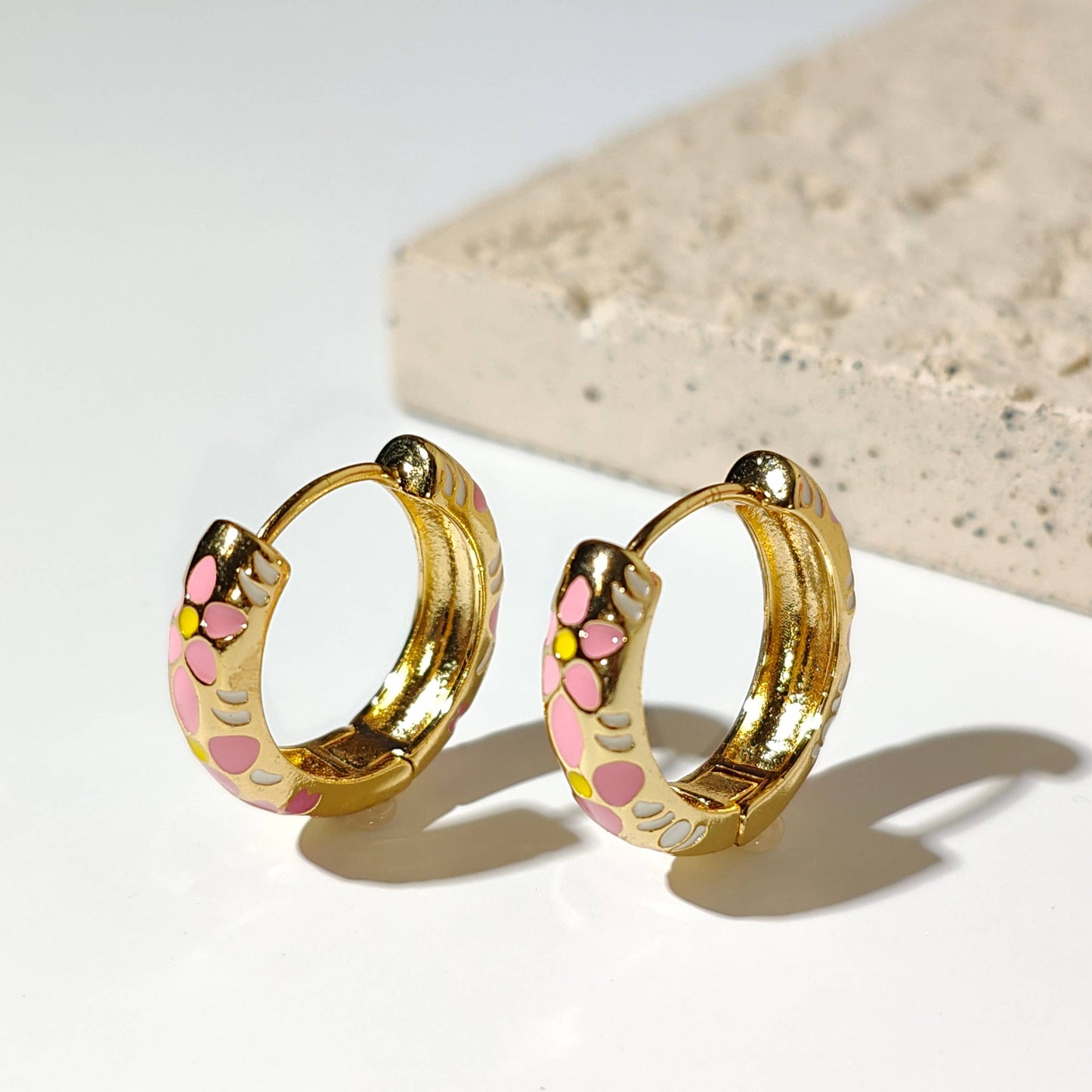 Flower Pastel gold plated hoop earrings.