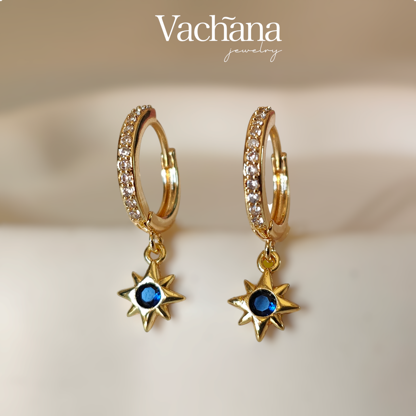 Gold plated hoops with stars hanging