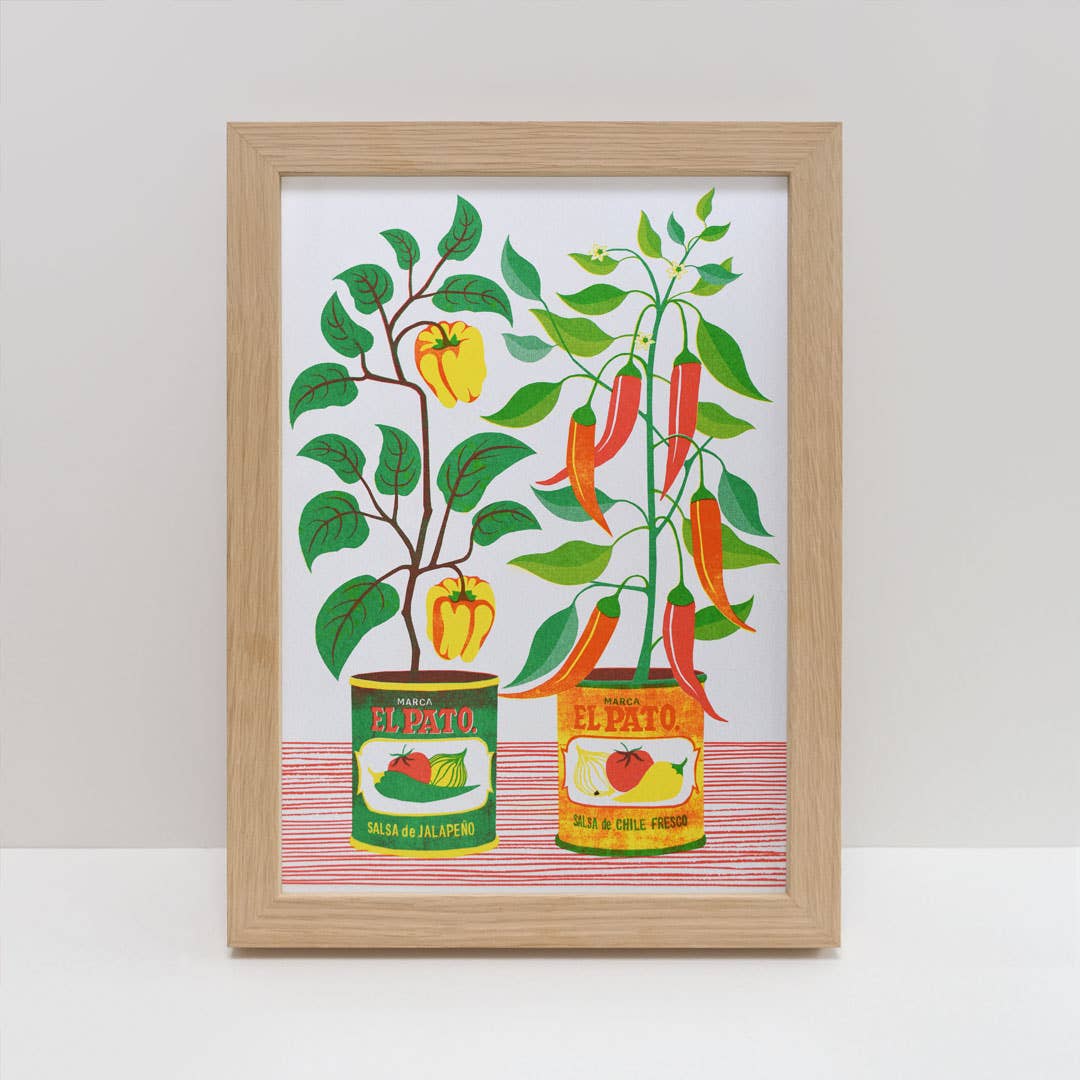 Risograph print of chillis growing in tins.