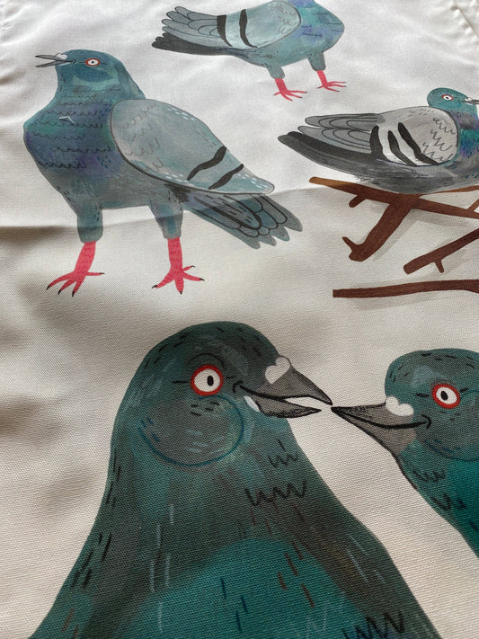 Illustration of pigeons on a fabric background