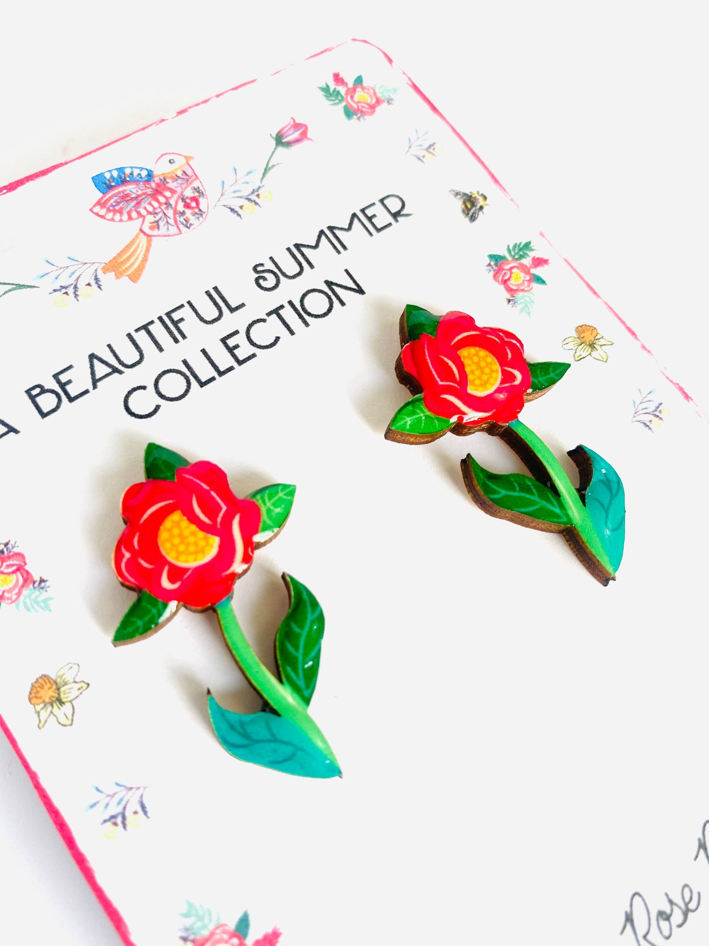 Resin and wooden flower earrings with stem.