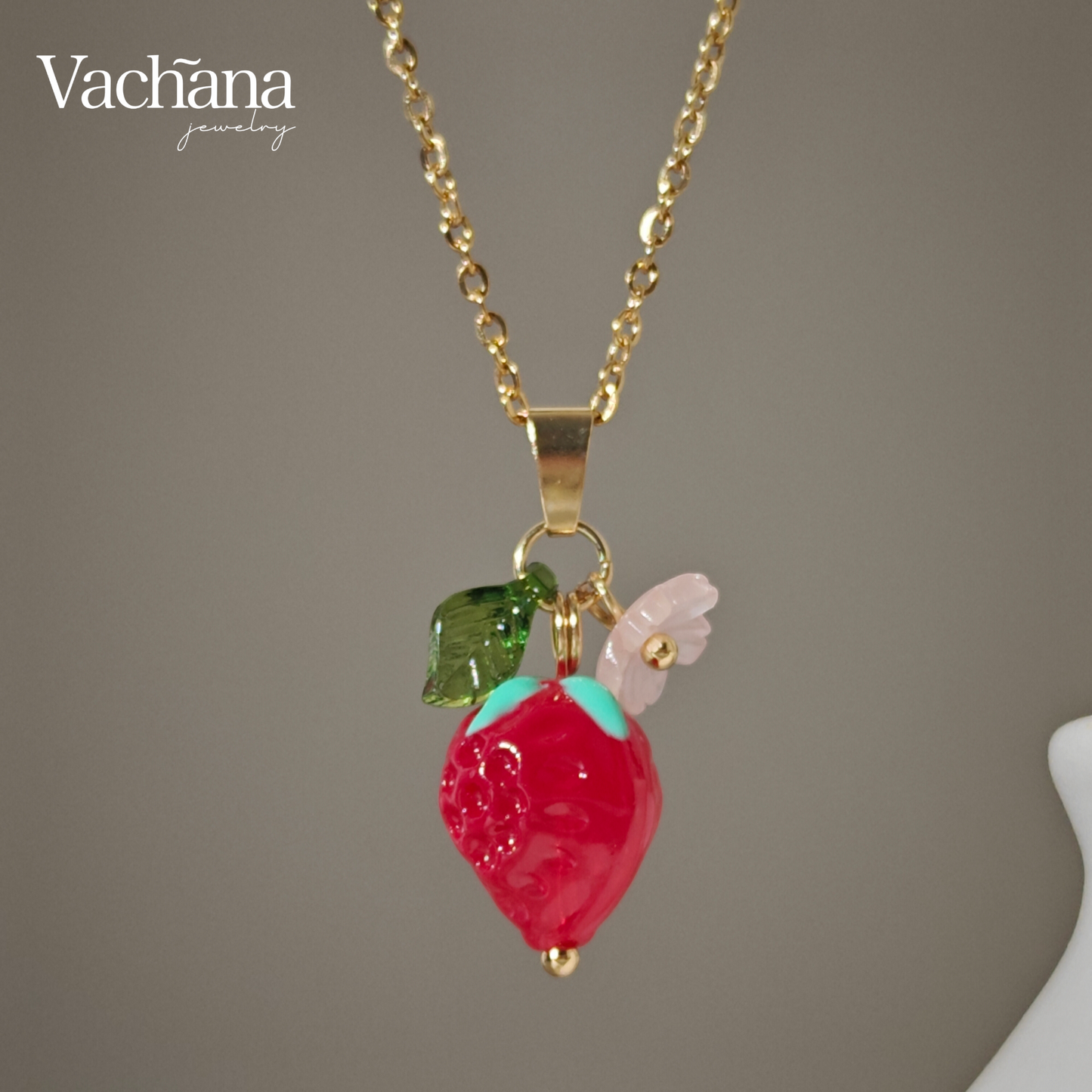 Glass Strawberry charm with arcylic leaf and flower on gold plated chain