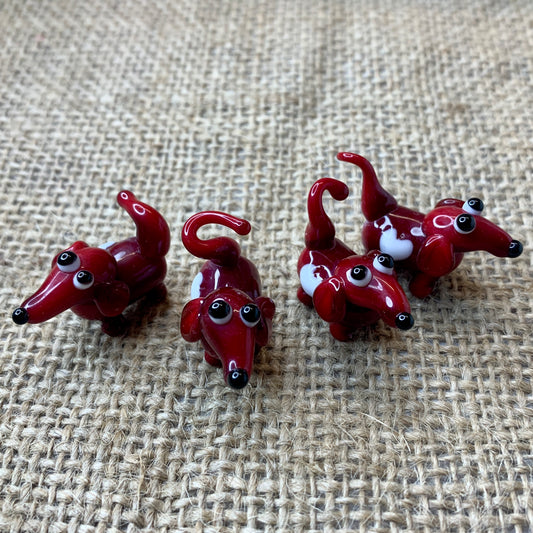 Bristol Blue with powder blue spots glass dogs, approx 1 cm x 3cm handmade in Bristol