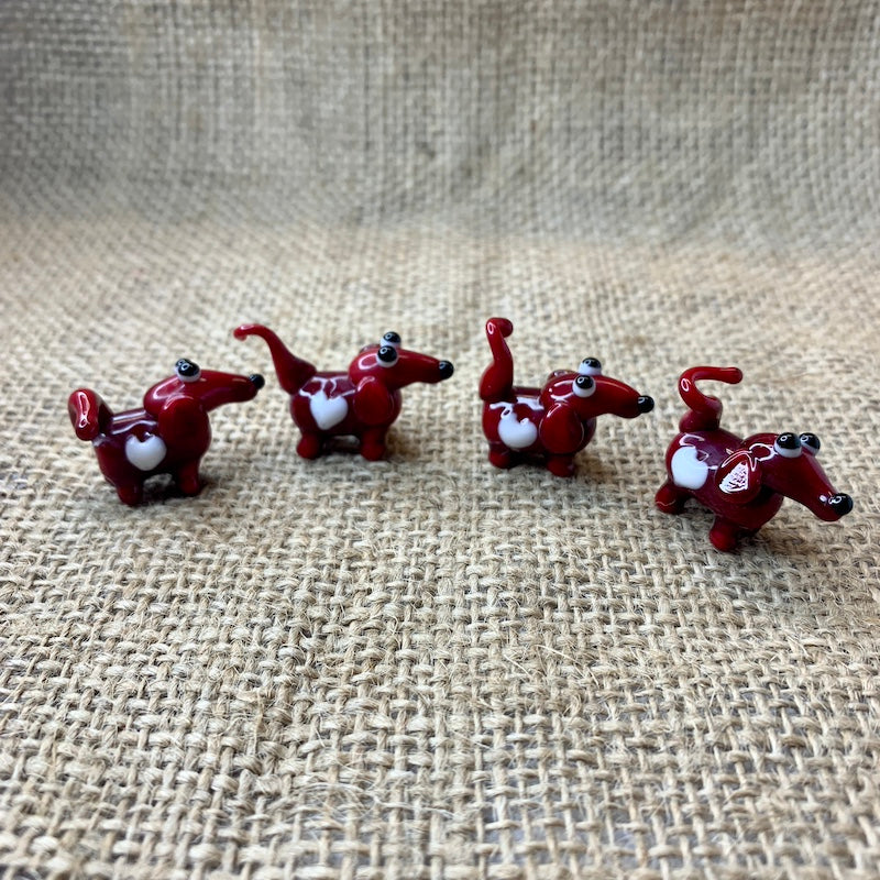 Bristol Blue with powder blue spots glass dogs, approx 1 cm x 3cm handmade in Bristol
