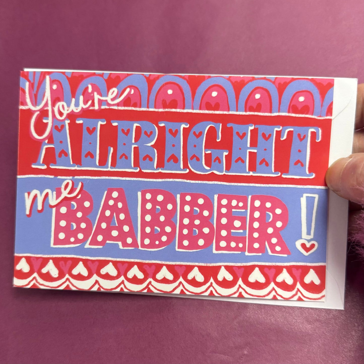 You're alright me babber, brightly coloured text. Blank inside.