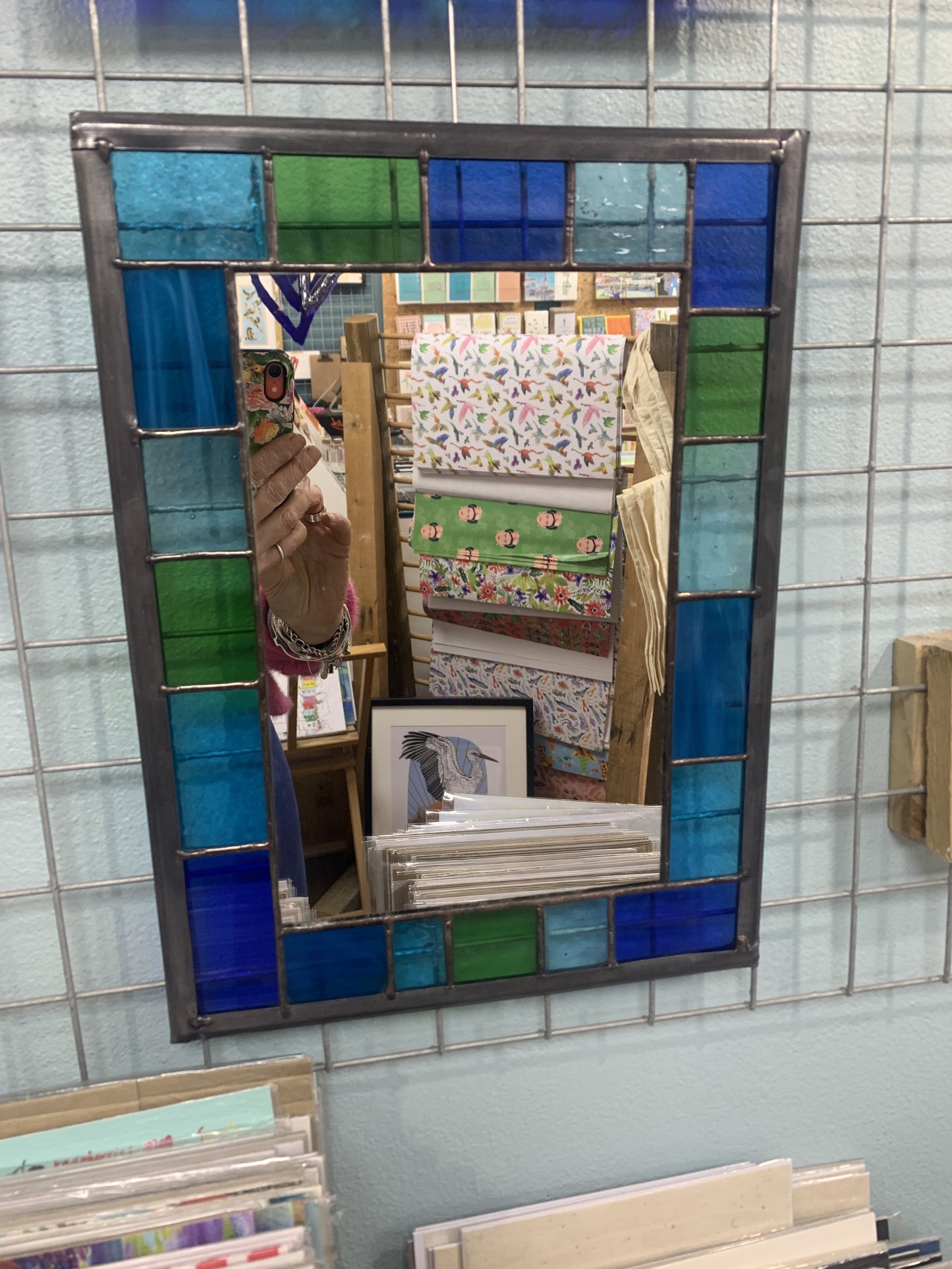 Stained Glass Mirror with randomly placed blue and green glass border.Stained Glass Mirror with randomly placed blue and green glass border. Stained Glass. Traditional Colour Glass. Blues, Aqua and Turquoise Glass.