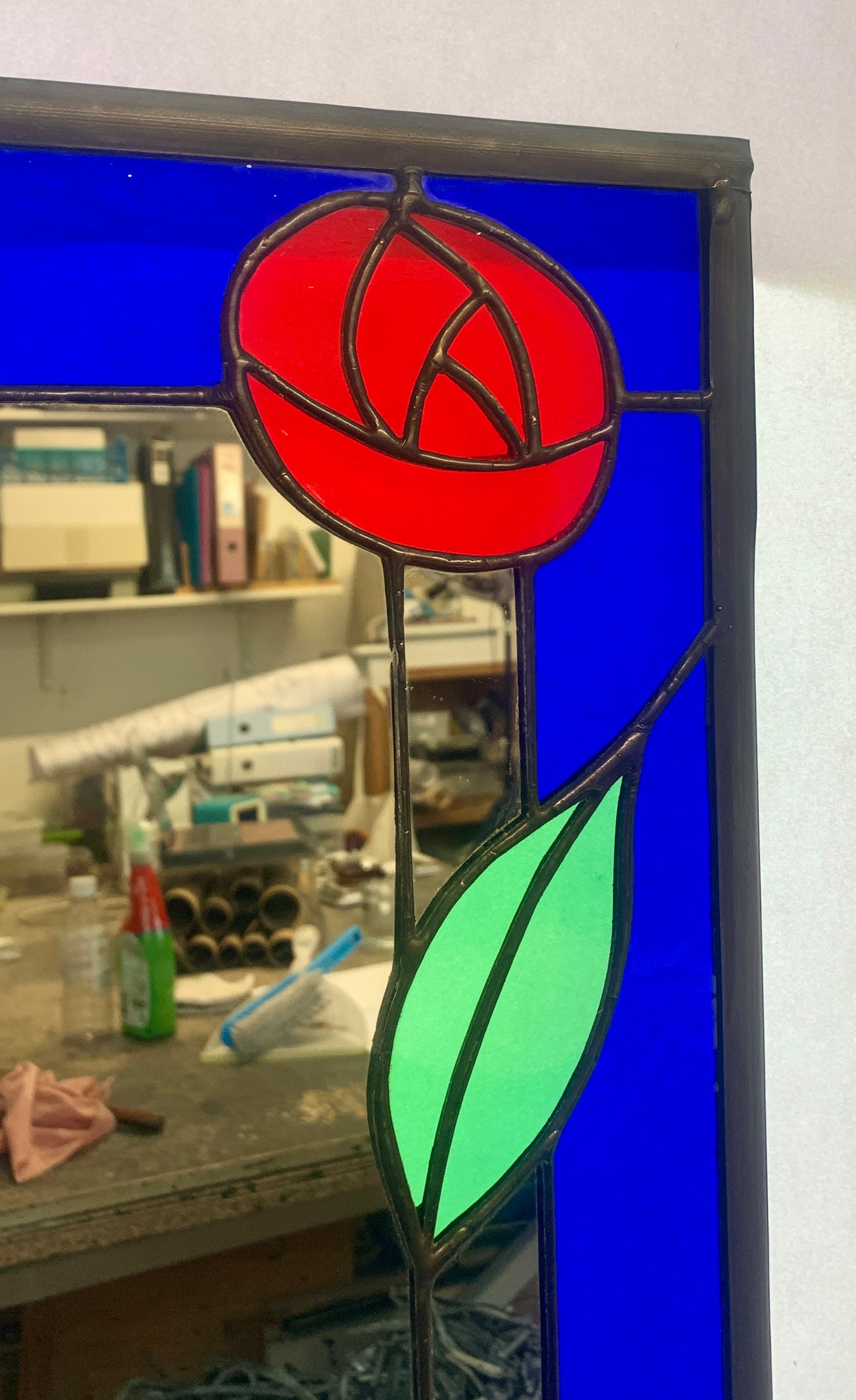 Stained Glass Mirror. Mackintosh Rose with Bristol Blue border