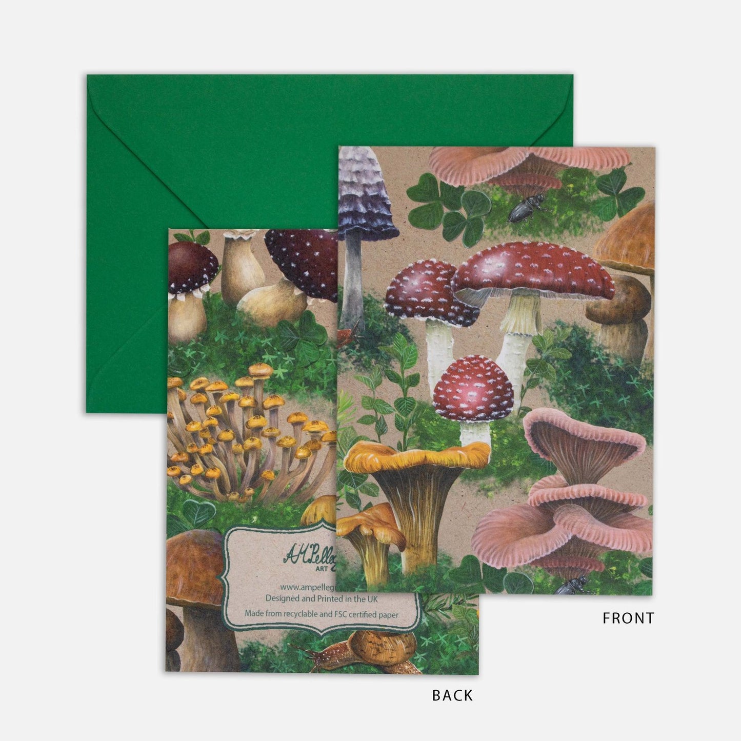 This bold Woodland Shrooms greeting card features a dense design of various mushrooms and fungi, surrounded by patches of moss. It has been printed on a sandy beige background. A bright red toadstool (or Fly Agaric) is sitting right in the middle of the card. The red Fly Agaric is surrounded by Chanterelles, Pink Oyster mushrooms, Inkcap mushrooms and an occasional snail or slug crawling through here and there. The design wraps around the front and the back of the card.