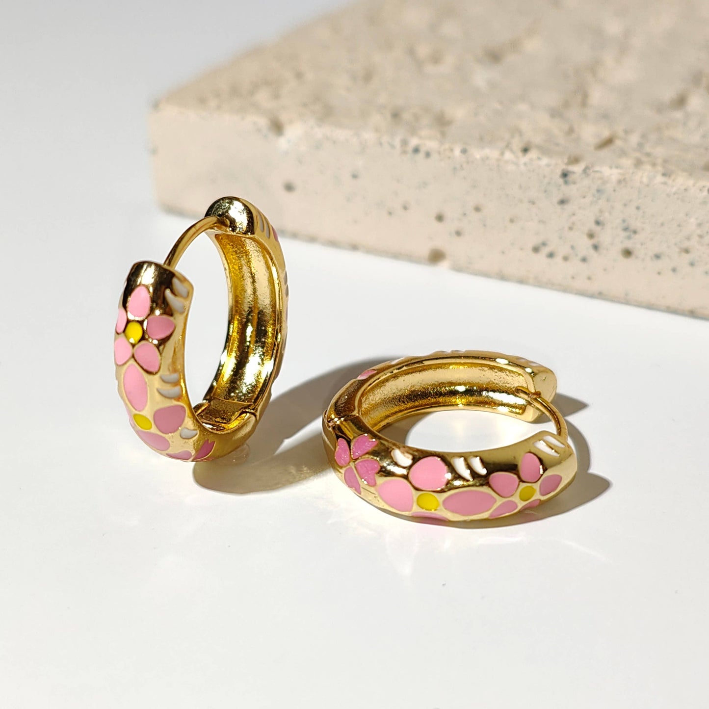 Flower Pastel gold plated hoop earrings.