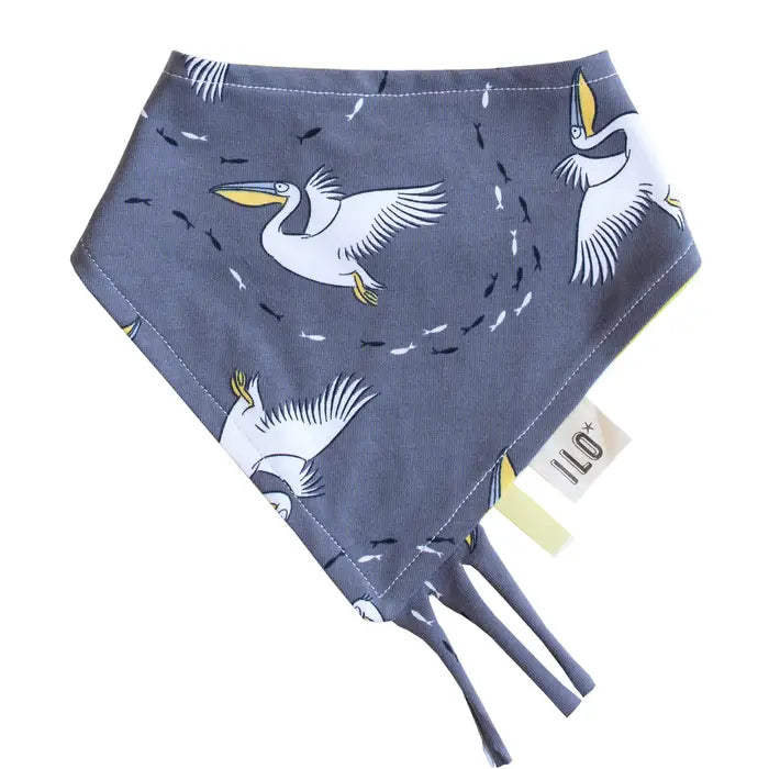 Baby Bib, for 0 to 2 years. The reversible fabric bib has a pelican design on a grey background.