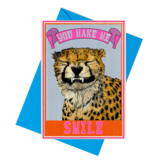 Grinning cheetah with the caption you make me smile. Card is blank inside.