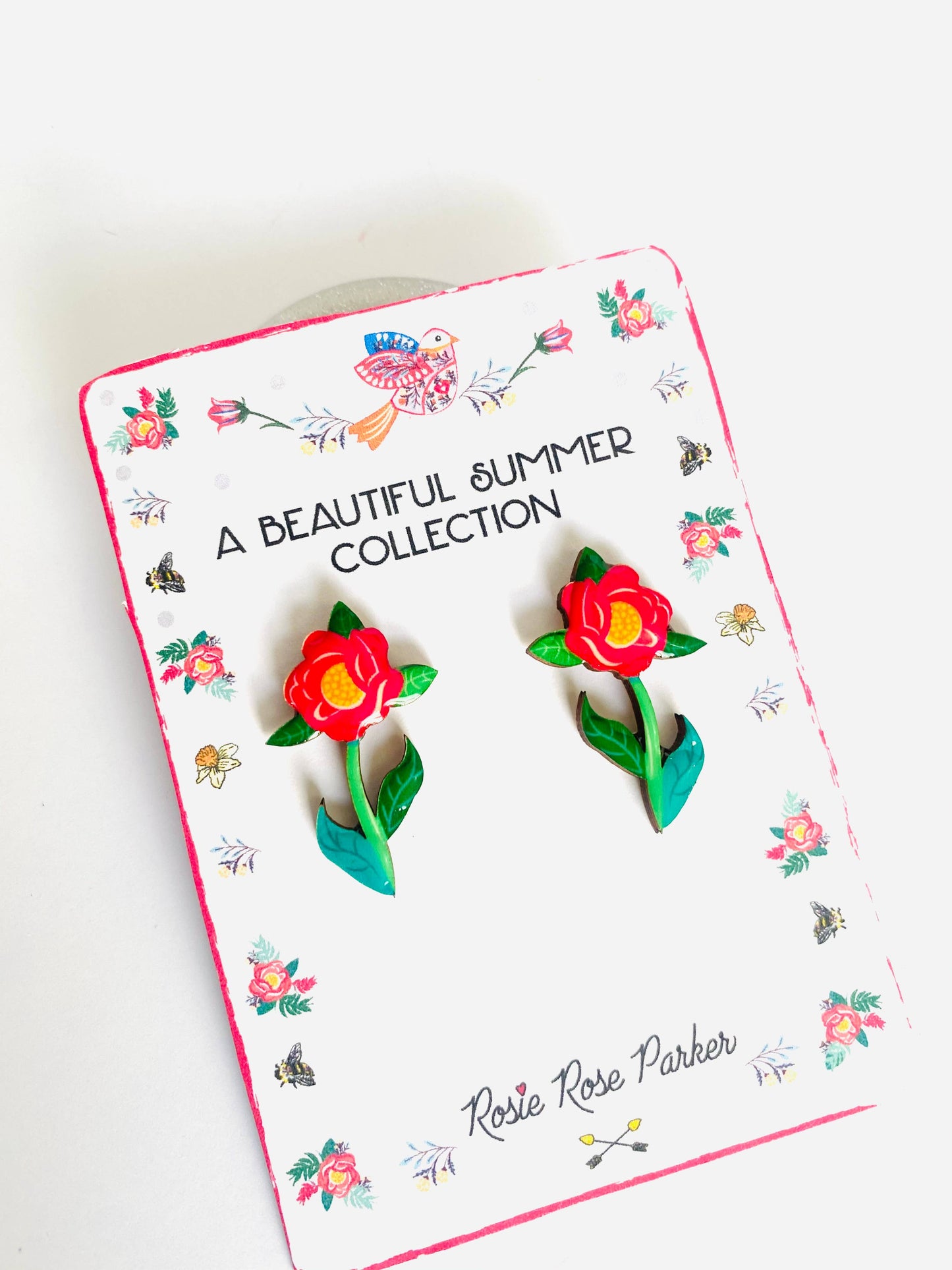 Resin and wooden flower earrings with stem.