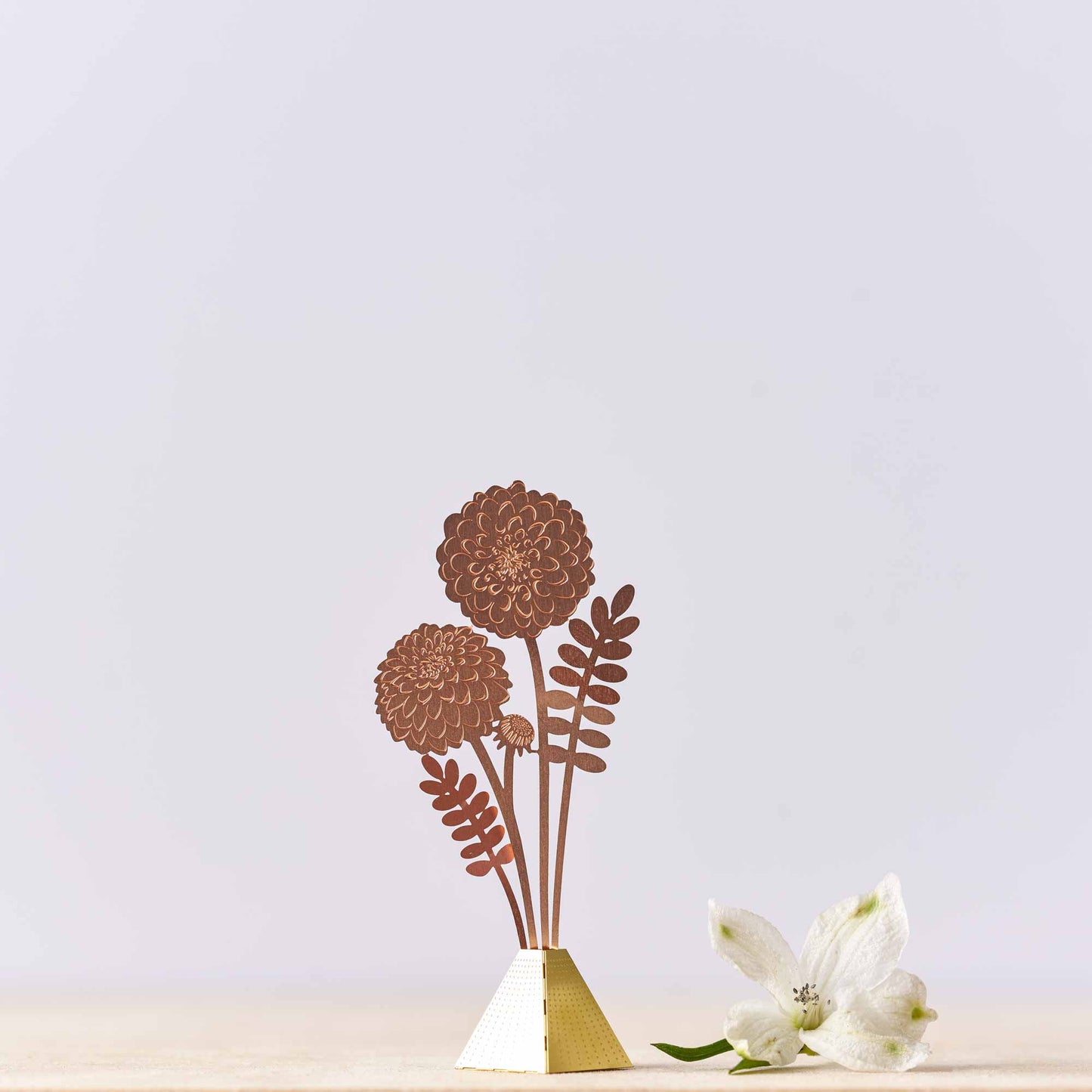 Tiny brass bouquet of Dahlias