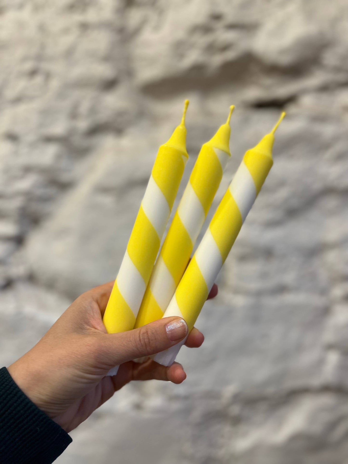 Helter skelter yellow and white spiral dinner candles.