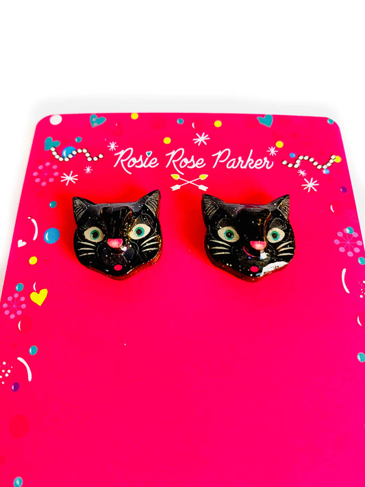 Wood and resin black cat 3 d studs.