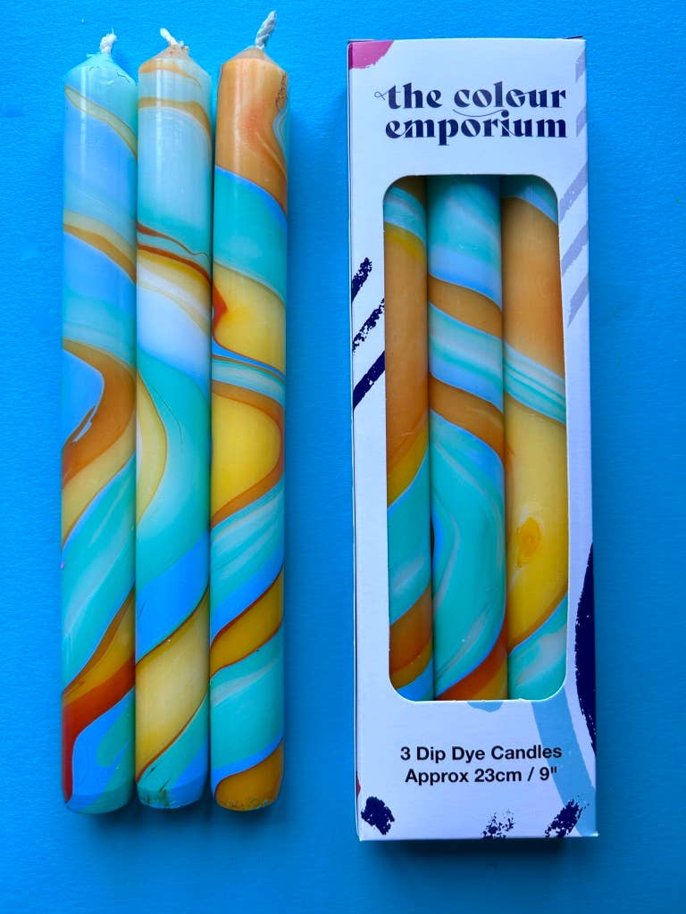 marbled dinner candles, blues and yellows.