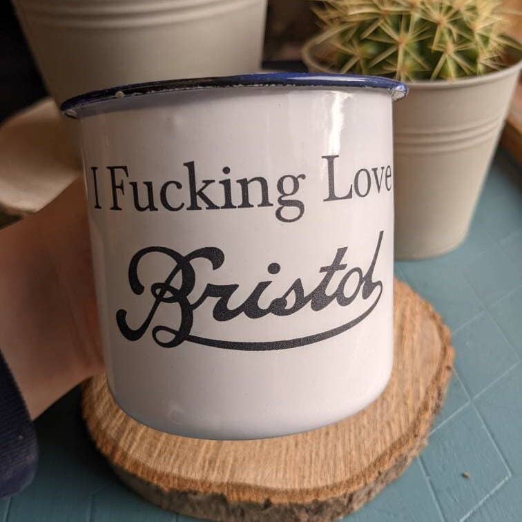 Enamel tin mug with laser cut scroll Bristol or I Fucking Love Bristol.