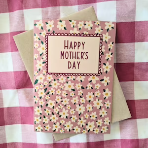 Happy Mothers Day Card scattered all over with little daisies.
