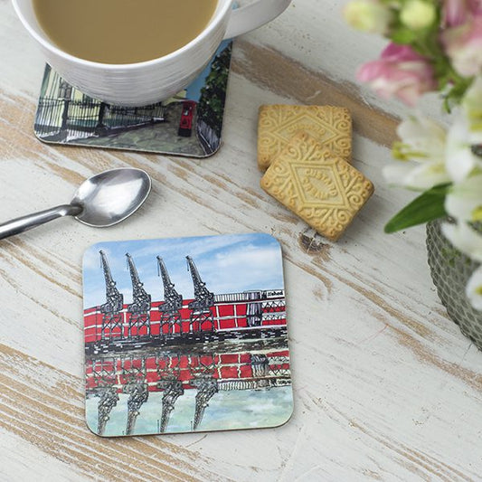 Coaster with illustration of the Mshed and cranes in Bristol
