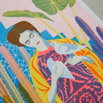risograph print of Frida Kahlo holding doves