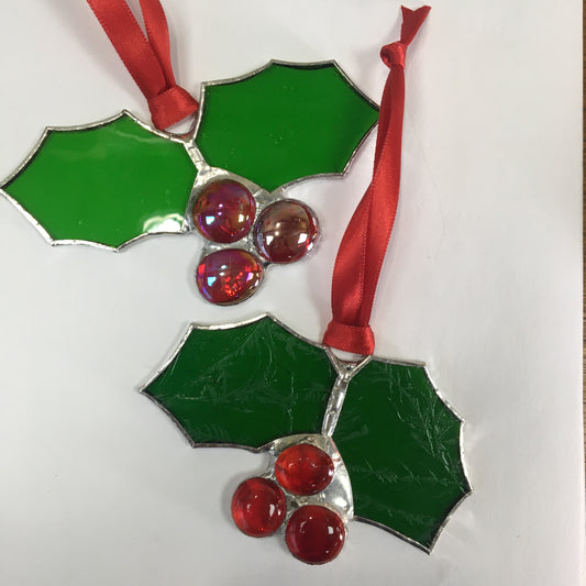 2 x Christmas Holly, stained glass, Christmas decoration on a white background with red ribbon