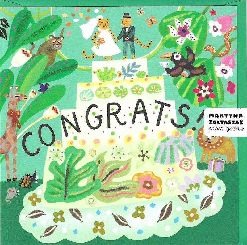 Brightly illustrated jungle themed wedding cake with leopard Bride and Groom on top of wedding cake.