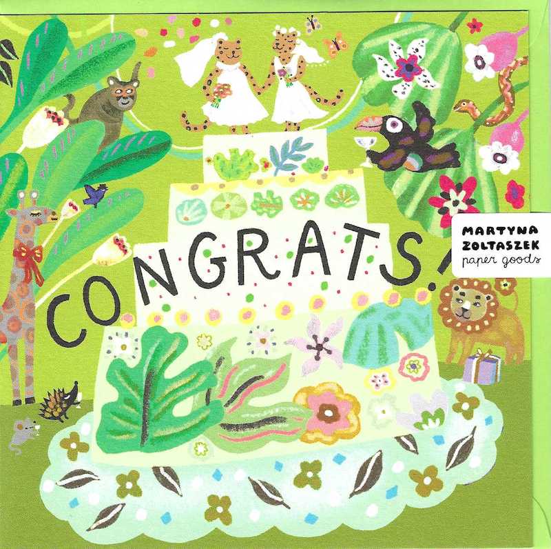 Two Leopard Brides on top of wedding cake with jungle characters decorating.