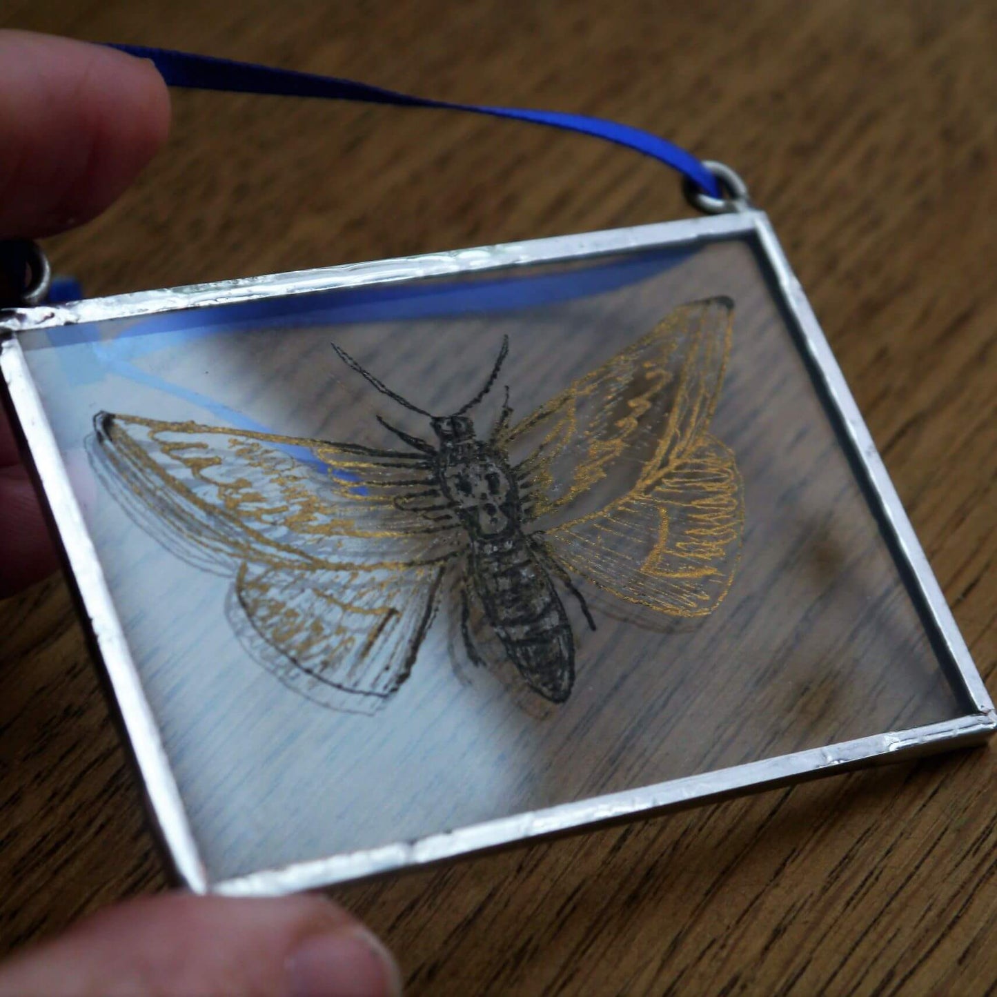 The Corbeau Press Moth With Skull Hanging