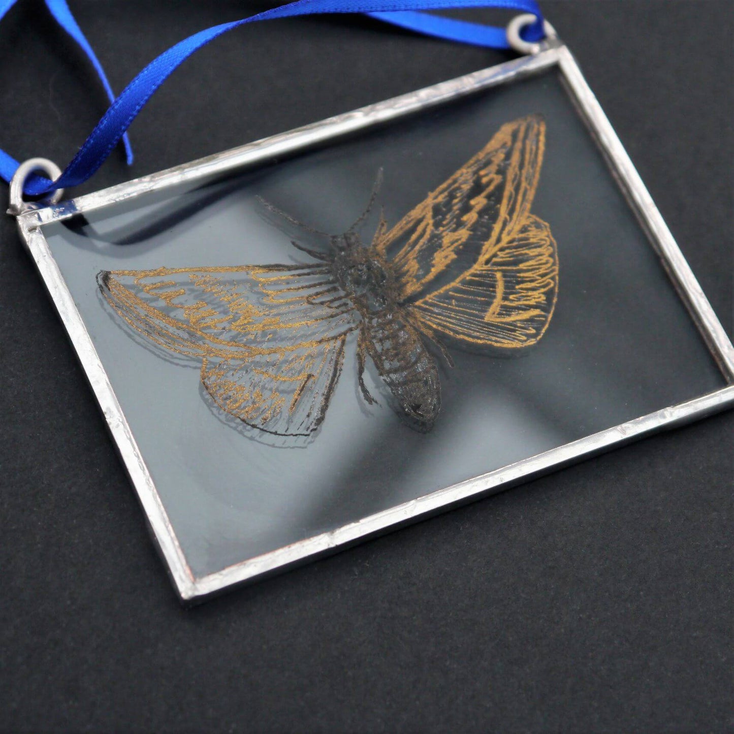 The Corbeau Press Moth With Skull Hanging