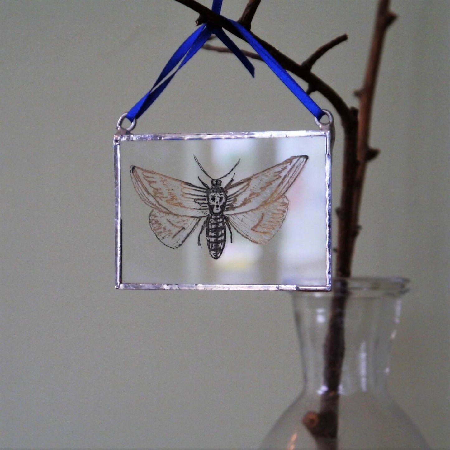 The Corbeau Press Moth With Skull Hanging