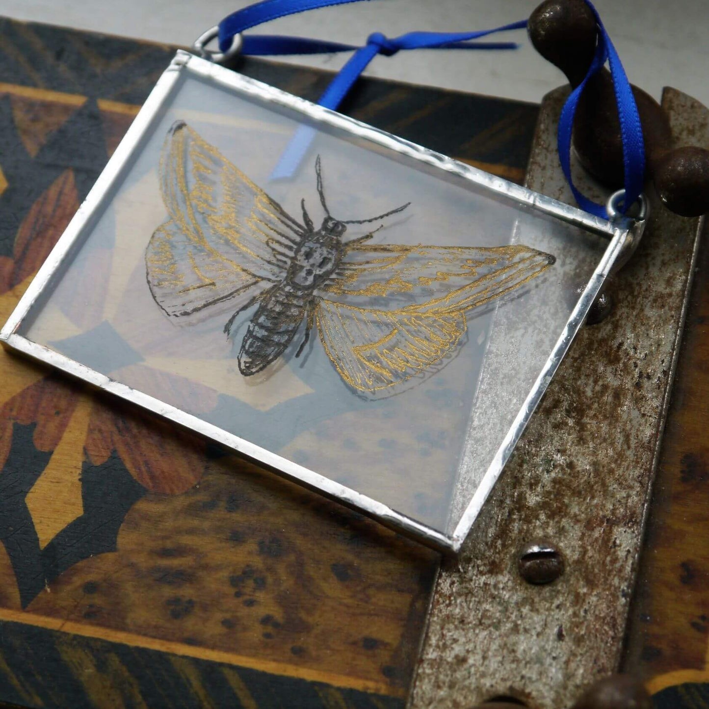 The Corbeau Press Moth With Skull Hanging